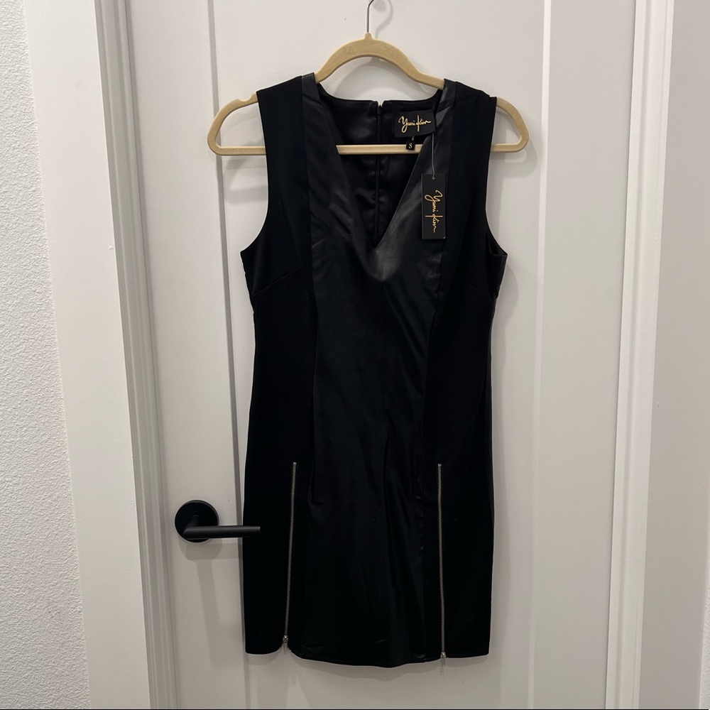 Black Faux leather mini dress by YUMI KIM